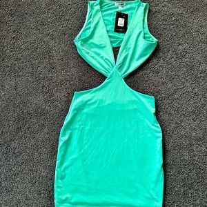 Mint green backless cut out side little cleavage dress from Fashionnova.